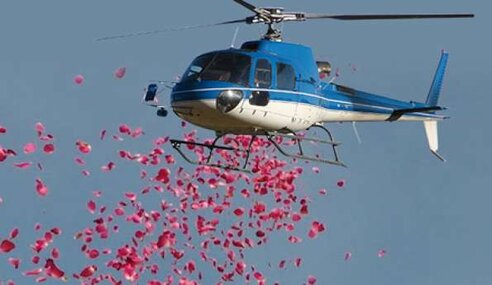 Helicopter for flower drop